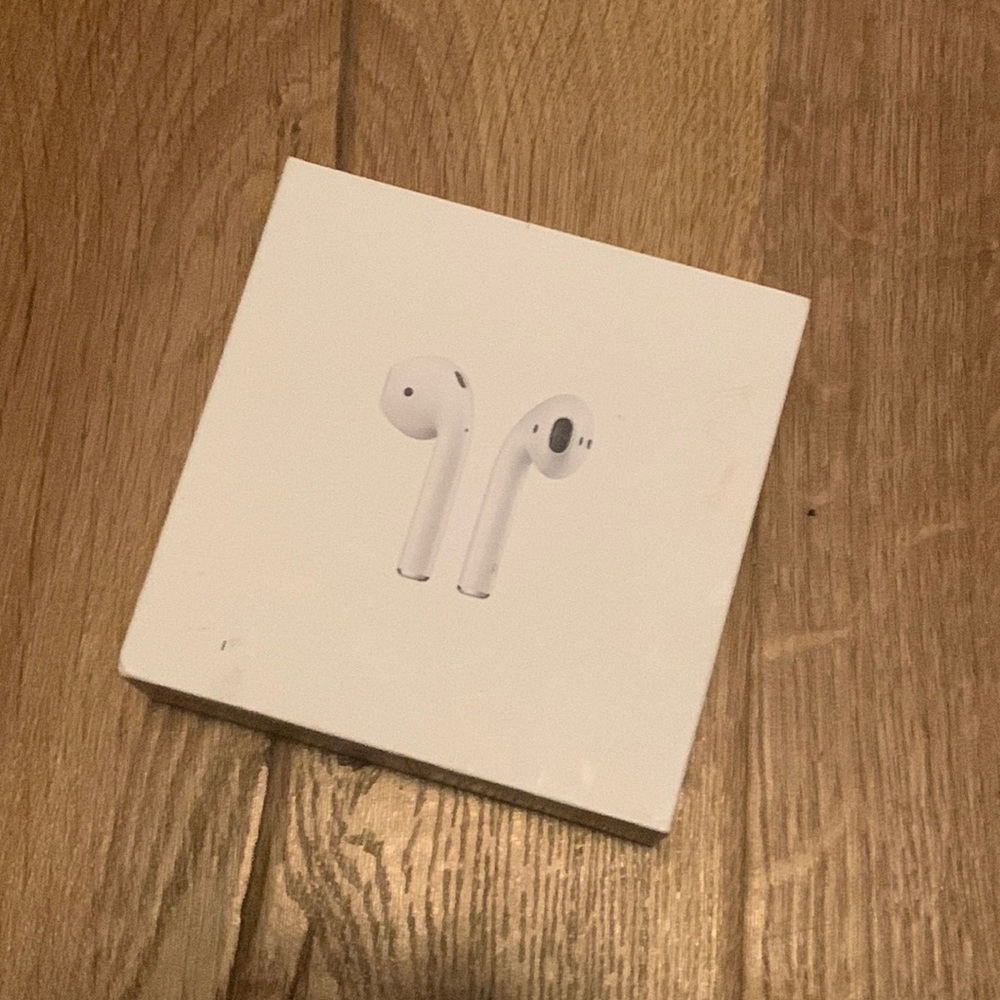 AirPods with its apple packaging (like new) 🤍🤍